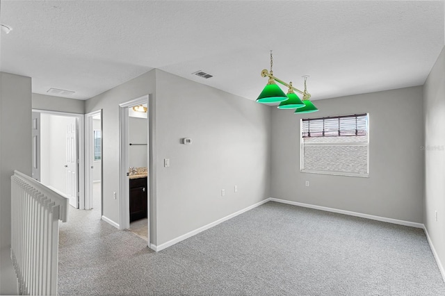 15604 Starlite St, Clermont, FL 34714 - spare room with carpet flooring and a textured ceiling