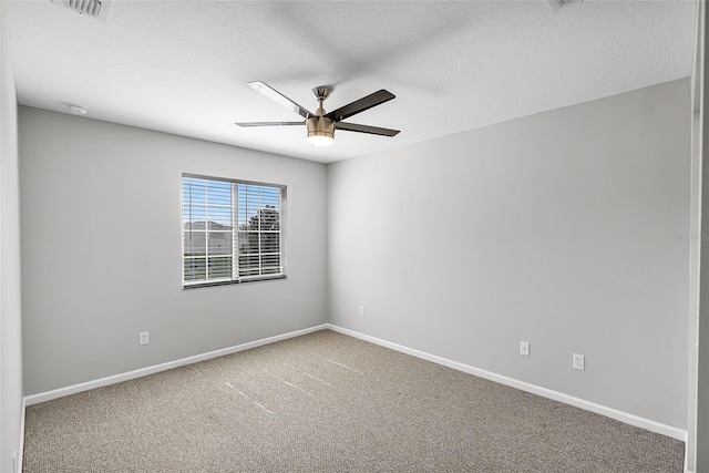 15604 Starlite St, Clermont, FL 34714 - carpeted spare room featuring a ceiling fan, a textured ceiling, and a smoke detector