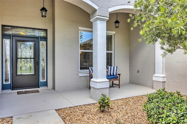 3681 Arlington Ridge Blvd, Leesburg, FL 34748 - view of exterior entry with stucco siding
