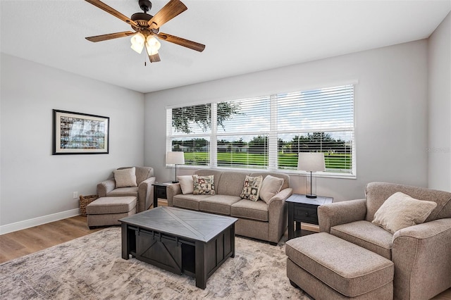 3681 Arlington Ridge Blvd, Leesburg, FL 34748 - living room with light wood-style flooring and ceiling fan
