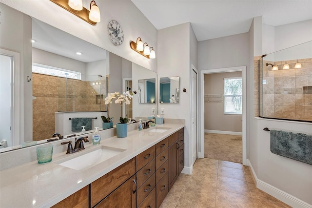 3681 Arlington Ridge Blvd, Leesburg, FL 34748 - bathroom featuring tiled shower, double vanity, and tile patterned flooring