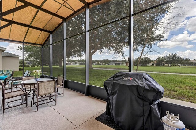 3681 Arlington Ridge Blvd, Leesburg, FL 34748 - sunroom / solarium featuring vaulted ceiling and outdoor dining area