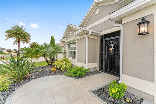 3750 Raspberry Ct, The Villages, FL 32163 - property entrance featuring stucco siding