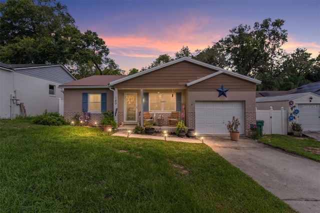 149 Shiloh Ave, Lady Lake, FL 32159 - ranch-style home with brick siding, driveway, and a garage