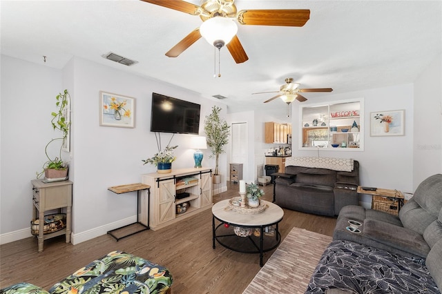149 Shiloh Ave, Lady Lake, FL 32159 - living area with wood finished floors and ceiling fan