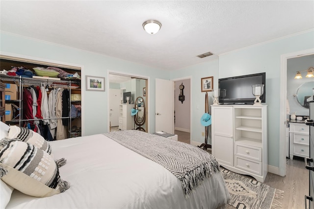 149 Shiloh Ave, Lady Lake, FL 32159 - bedroom with wood finished floors and crown molding