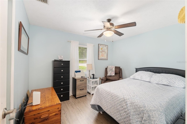 149 Shiloh Ave, Lady Lake, FL 32159 - bedroom with light wood-type flooring and ceiling fan