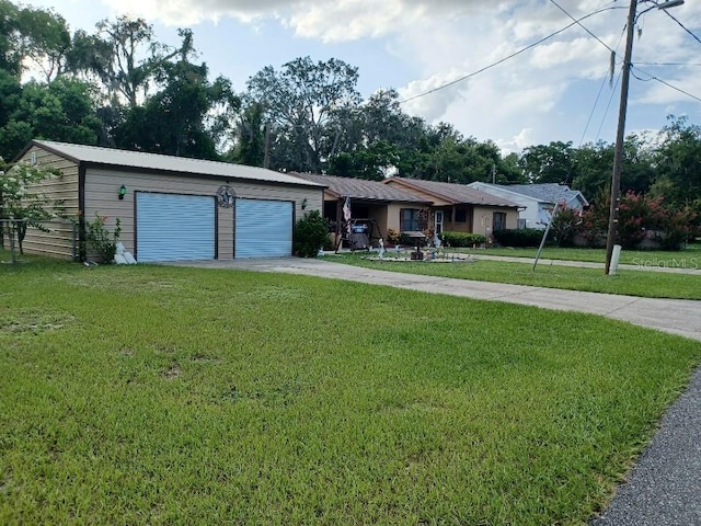 505 Richard St, Leesburg, FL 34748 - ranch-style house with concrete driveway, a front yard, and an attached garage