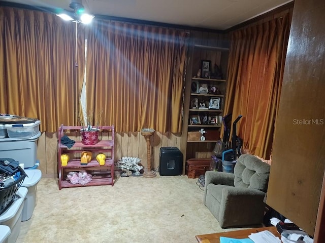 505 Richard St, Leesburg, FL 34748 - sitting room with carpet flooring and wood walls