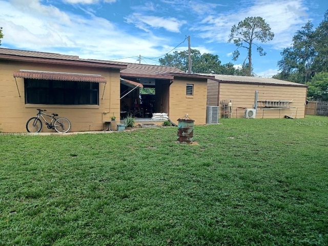 505 Richard St, Leesburg, FL 34748 - back of house with a yard