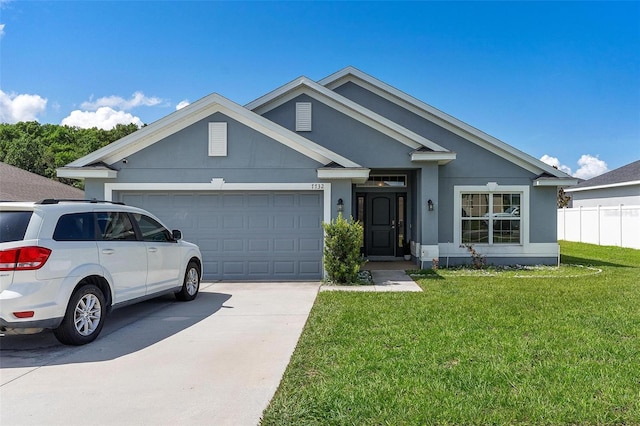 7732 Sloewood Dr, Leesburg, FL 34748 - single story home with a garage and concrete driveway