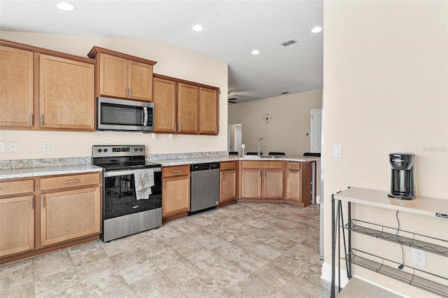 7732 Sloewood Dr, Leesburg, FL 34748 - kitchen with appliances with stainless steel finishes, light countertops, vaulted ceiling, and recessed lighting