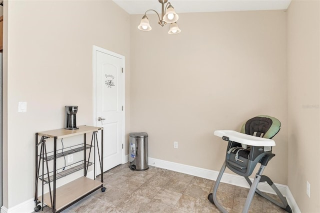 7732 Sloewood Dr, Leesburg, FL 34748 - unfurnished dining area with baseboards and a chandelier
