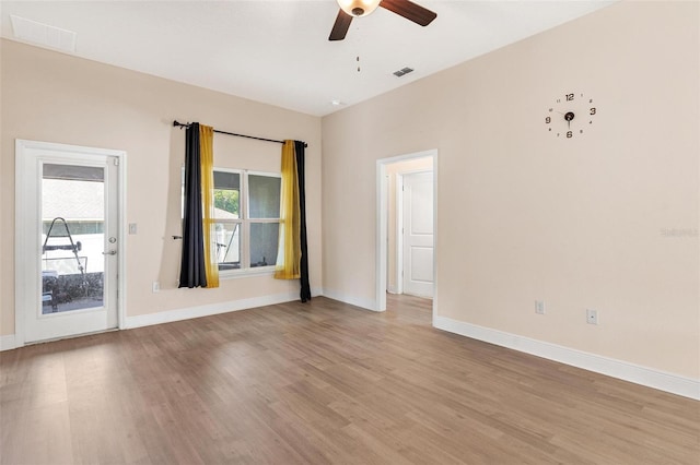 7732 Sloewood Dr, Leesburg, FL 34748 - unfurnished room featuring light wood finished floors and ceiling fan