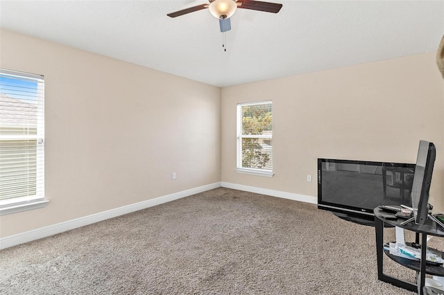 7732 Sloewood Dr, Leesburg, FL 34748 - carpeted spare room featuring a ceiling fan and baseboards