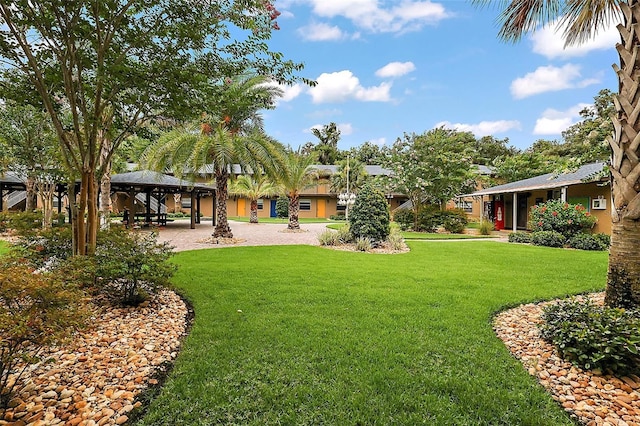 600 W Oak Terrace Dr, Leesburg, FL 34748 - view of green lawn with a gazebo