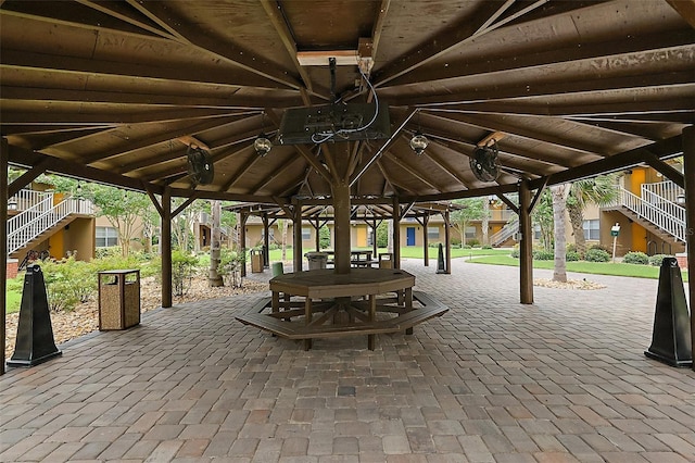 600 W Oak Terrace Dr, Leesburg, FL 34748 - surrounding community featuring stairs and a patio