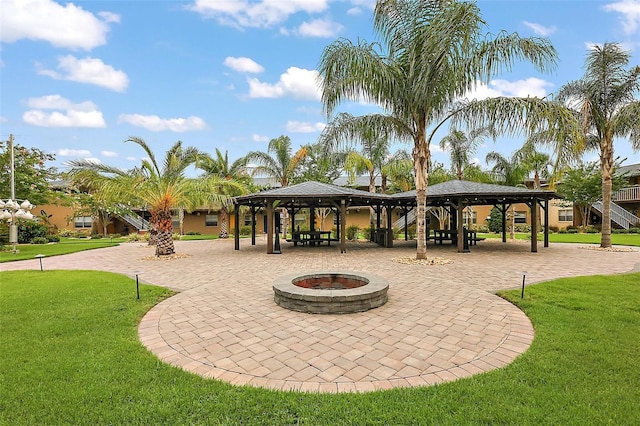 600 W Oak Terrace Dr, Leesburg, FL 34748 - view of home's community featuring a gazebo, a fire pit, and a yard