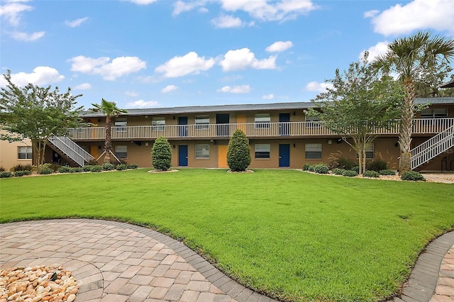 600 W Oak Terrace Dr, Leesburg, FL 34748 - view of property's community featuring stairs and a yard