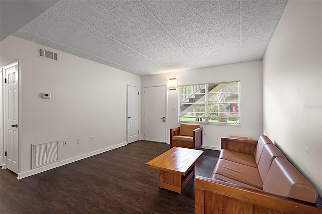 600 W Oak Terrace Dr, Leesburg, FL 34748 - living room featuring wood finished floors and a textured ceiling
