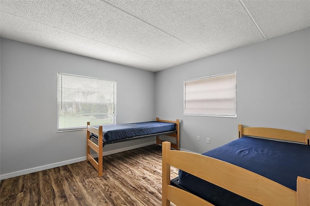 600 W Oak Terrace Dr, Leesburg, FL 34748 - bedroom featuring wood finished floors and baseboards