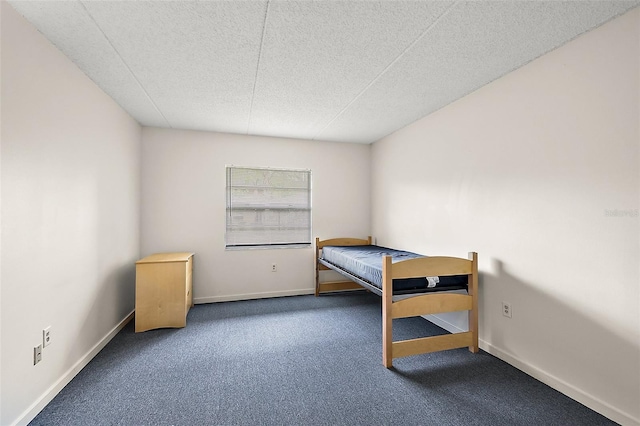 600 W Oak Terrace Dr, Leesburg, FL 34748 - unfurnished bedroom featuring carpet and a textured ceiling