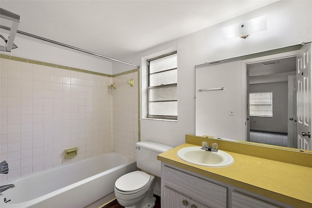 600 W Oak Terrace Dr, Leesburg, FL 34748 - bathroom with vanity, bathtub / shower combination, and healthy amount of natural light