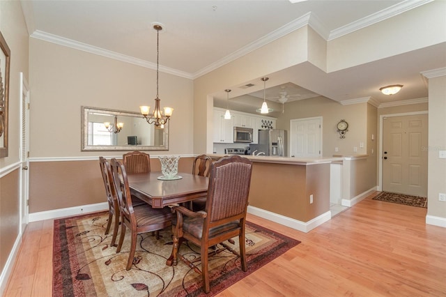 9025 Colby Dr Unit 2121, Fort Myers, FL 33919 - dining room with light wood-style flooring, ornamental molding, and a chandelier
