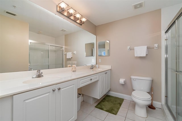 9025 Colby Dr Unit 2121, Fort Myers, FL 33919 - full bath featuring double vanity, a stall shower, and tile patterned flooring