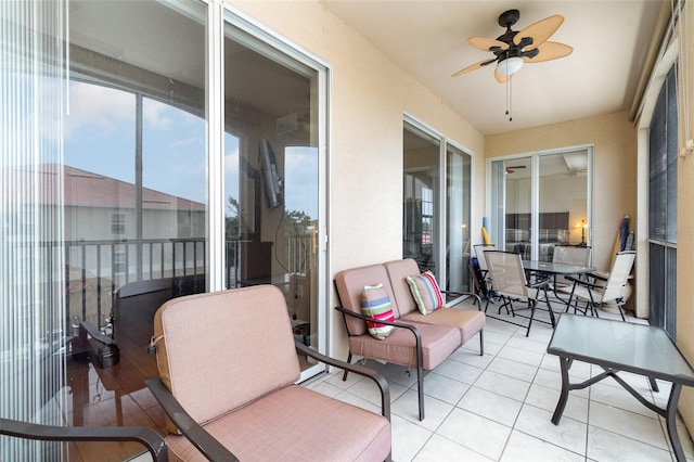 9025 Colby Dr Unit 2121, Fort Myers, FL 33919 - sunroom featuring ceiling fan