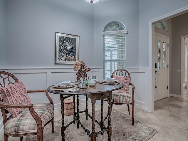 1982 Eldridge Loop, The Villages, FL 32162 - dining area with a decorative wall and a wainscoted wall