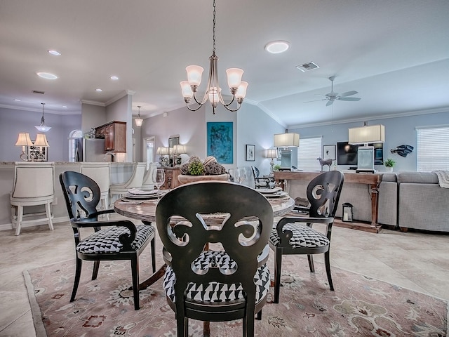 1982 Eldridge Loop, The Villages, FL 32162 - dining area featuring ornamental molding, a ceiling fan, vaulted ceiling, a chandelier, and recessed lighting