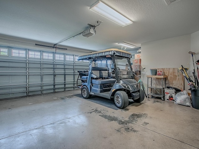1982 Eldridge Loop, The Villages, FL 32162 - garage with a garage door opener