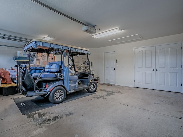 1982 Eldridge Loop, The Villages, FL 32162 - garage featuring a garage door opener