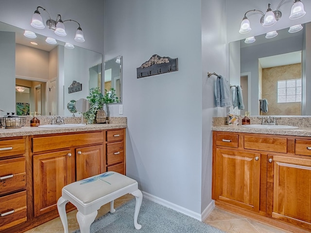 1982 Eldridge Loop, The Villages, FL 32162 - bathroom with two vanities and tile patterned flooring