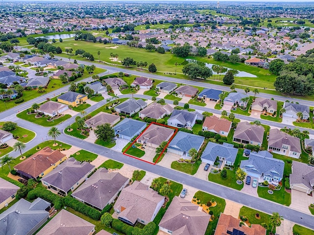 1982 Eldridge Loop, The Villages, FL 32162 - aerial view of residential area with a large body of water and property parcel outlined