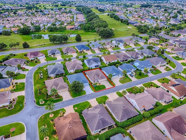 1982 Eldridge Loop, The Villages, FL 32162 - aerial view of residential area featuring a golf club, property boundaries highlighted, and a nearby body of water