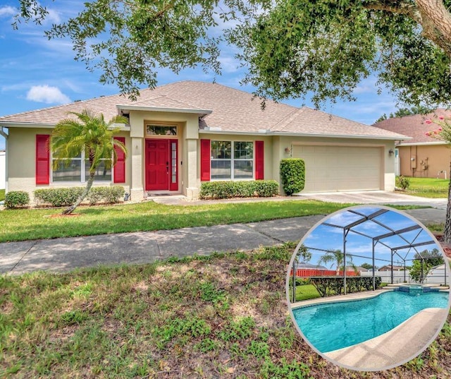 1216 Cheshire St, Groveland, FL 34736 - view of front of home with stucco siding, a front lawn, an attached garage, a pool with connected hot tub, and driveway