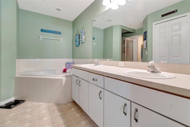 1216 Cheshire St, Groveland, FL 34736 - bathroom with double vanity, a garden tub, and a shower stall