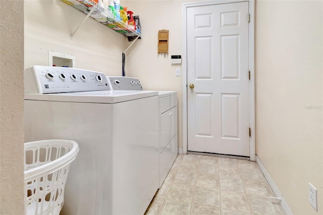 1216 Cheshire St, Groveland, FL 34736 - washroom featuring washing machine and dryer and baseboards