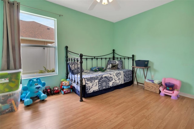 1216 Cheshire St, Groveland, FL 34736 - bedroom featuring wood finished floors and ceiling fan