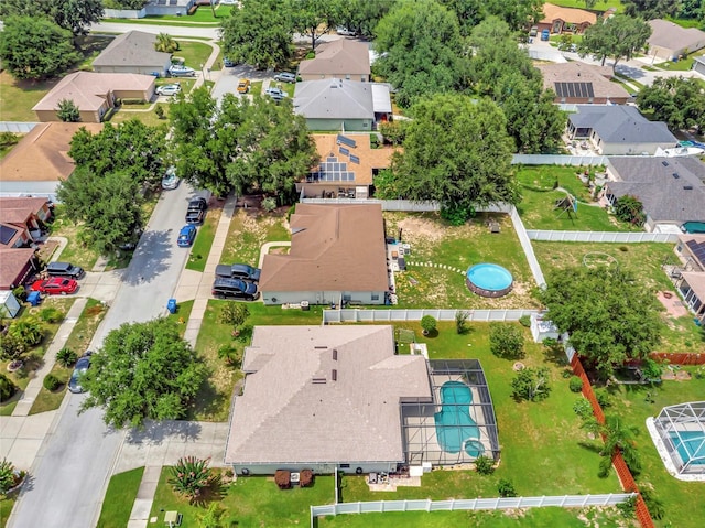 1216 Cheshire St, Groveland, FL 34736 - aerial perspective of suburban area featuring a pool area