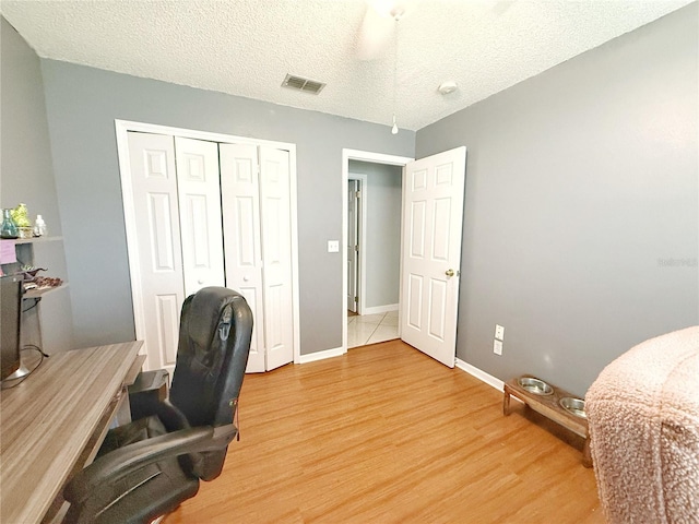 15349 Lafite Ln, Clermont, FL 34714 - home office featuring light wood-type flooring and baseboards