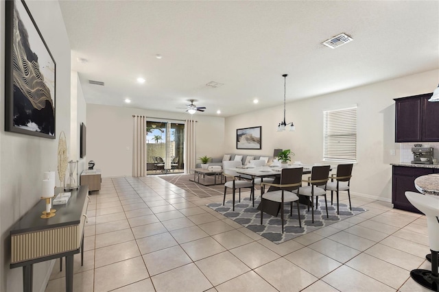 120 Citrus Isle St, Davenport, FL 33837 - dining area featuring light tile patterned floors, recessed lighting, and a ceiling fan
