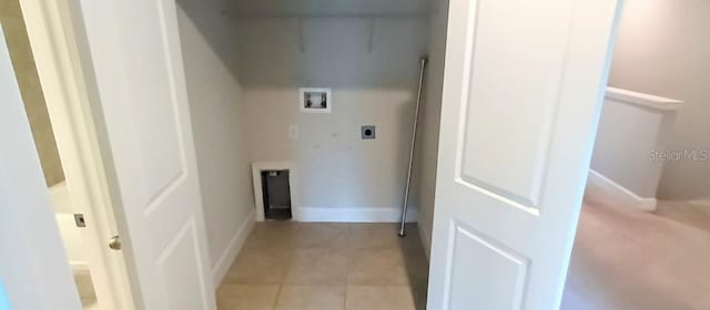 1867 Holden Ridge Ln, Clermont, FL 34715 - laundry room featuring washer hookup, hookup for an electric dryer, and light tile patterned floors