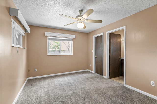 461 Kee St, Apopka, FL 32712 - unfurnished bedroom featuring carpet flooring, a textured ceiling, and a ceiling fan