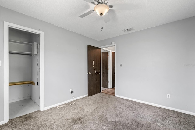 461 Kee St, Apopka, FL 32712 - unfurnished bedroom featuring carpet floors, a textured ceiling, a ceiling fan, and a closet