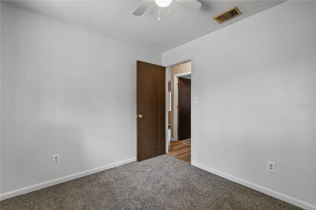 461 Kee St, Apopka, FL 32712 - spare room with carpet floors, ceiling fan, and a textured ceiling