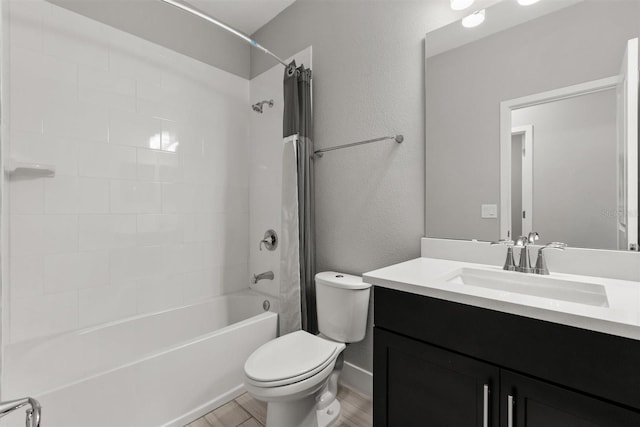 2163 White Feather Loop, Oakland, FL 34787 - bathroom with tub / shower combination, vanity, a textured wall, and wood finished floors