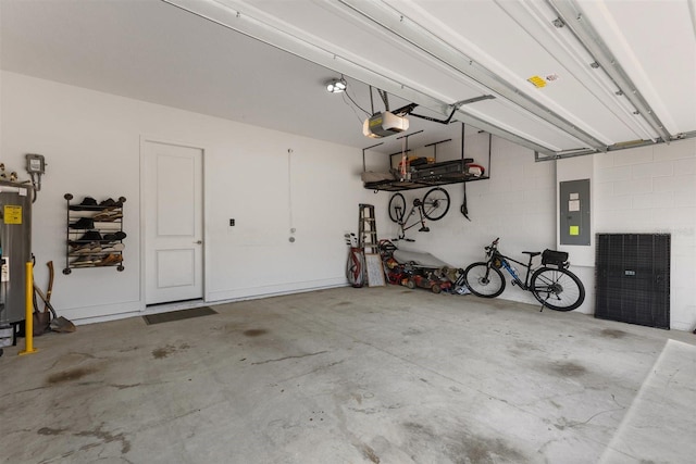 2163 White Feather Loop, Oakland, FL 34787 - garage with electric panel, a garage door opener, and water heater